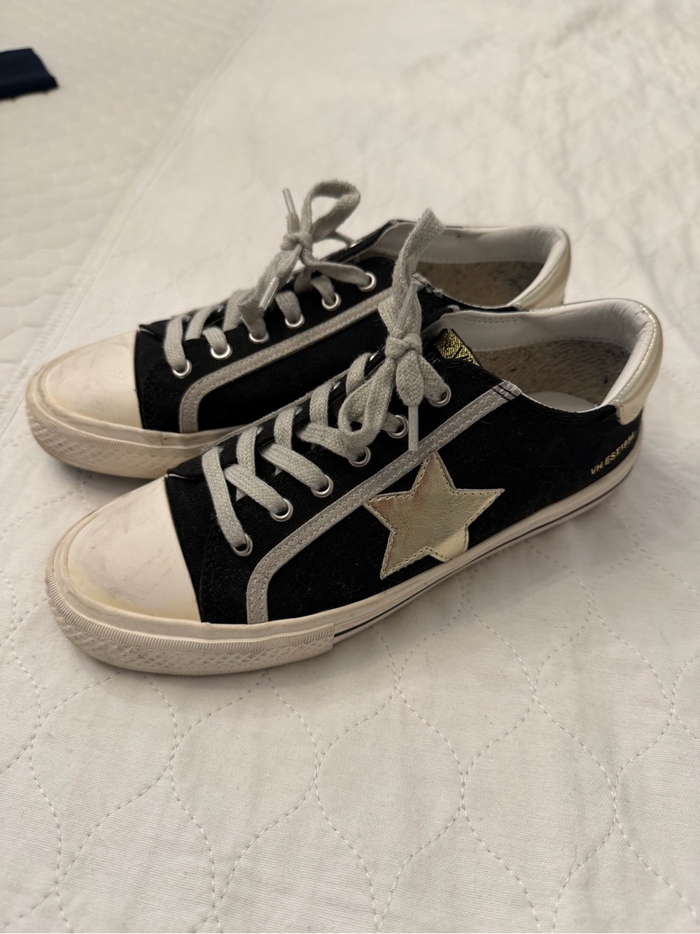 Vintage Havana Black Sneakers with Silver Star Accent